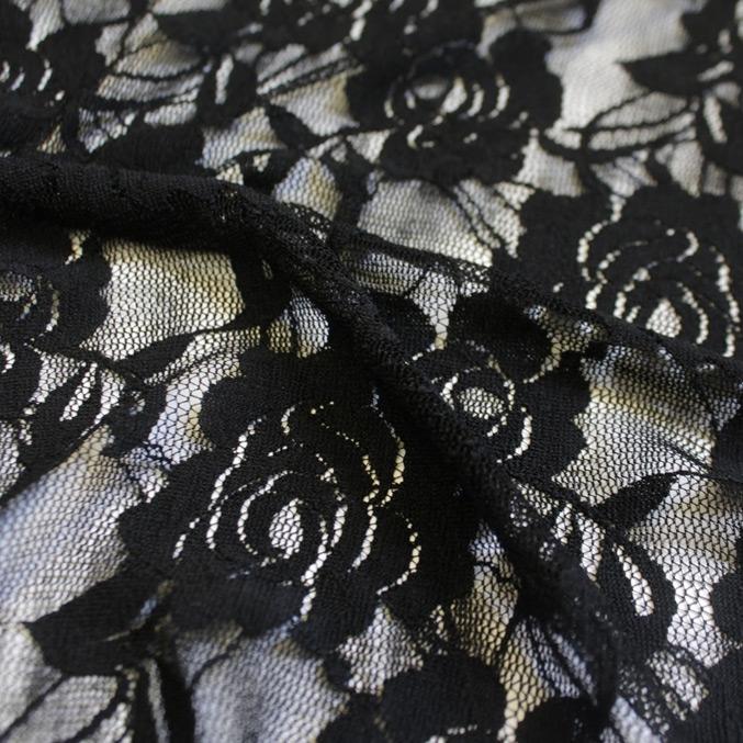 A swirled sample of Ada Stretch Lace in the color Black.