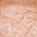 A swirled sample of Ada Stretch Lace in the color beige.