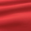 A ruffled sample of Antimicrobial Neoprene in the color red.