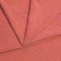 A folded piece of Blast Textured Spandex in neon coral.