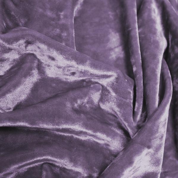 A crumpled pieces of Frozen Crushed Stretch Velvet in the color purple haze