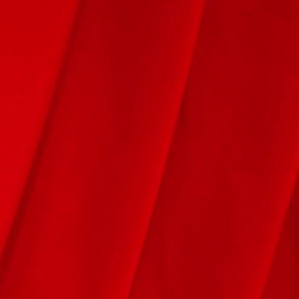 A flat sample of delite nylon spandex in the color poppy red.