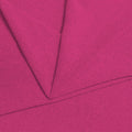 A folded piece of Blast Textured Spandex in bright pink.