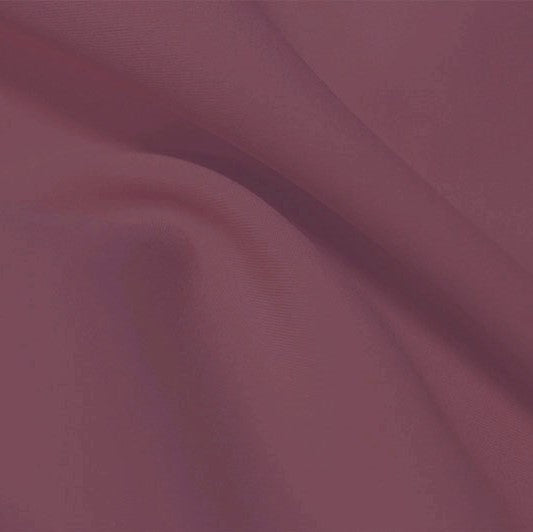 A flat sample of flexfilt recycled polyester spandex in the color mindful mauve.
