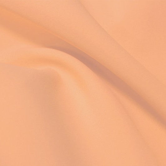 A flat sample of flexfilt recycled polyester spandex in the color rosy nude.