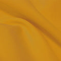 A flat sample of flexfilt recycled polyester spandex in the color saffron.