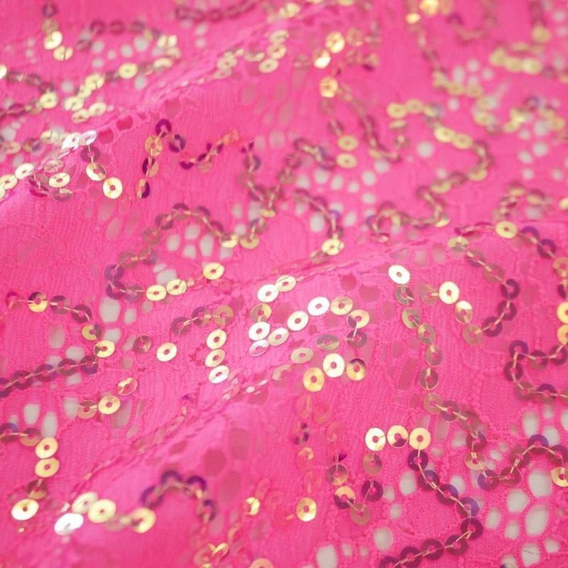 A flat sample of material girl stretch lace sequin in the color neon pink.