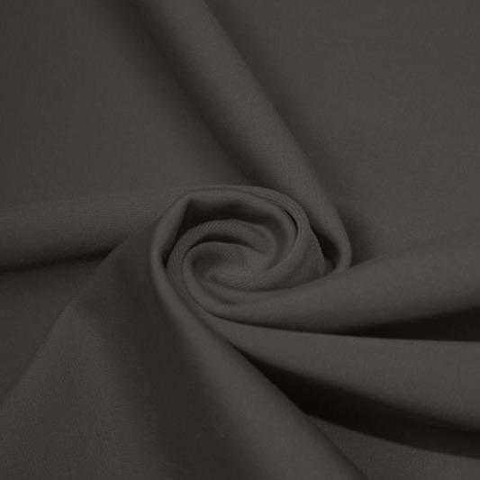 A swirled piece of matte nylon spandex fabric in the color slate gray.