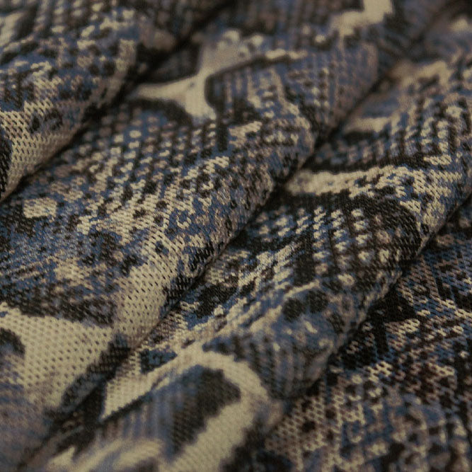 A folded sample of snake skin printed power mesh.