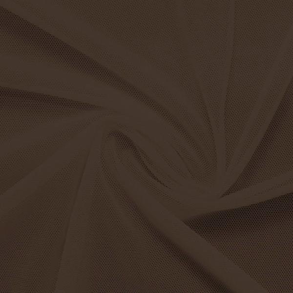 A swirled piece of nylon spandex power mesh in the color brown sugar.