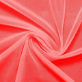A swirled piece of nylon spandex power mesh in the color coral.