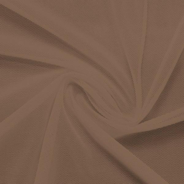 A swirled piece of nylon spandex power mesh in the color fawn.