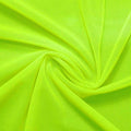 A swirled piece of nylon spandex power mesh in the color lemon lime.