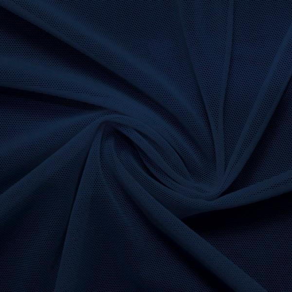 A swirled piece of nylon spandex power mesh in the color marine navy.
