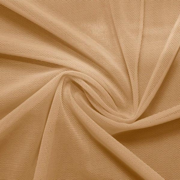 A swirled piece of nylon spandex power mesh in the color nude.