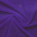 A swirled piece of nylon spandex power mesh in the color dark purple.