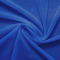 A swirled piece of nylon spandex power mesh in the color real royal.