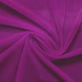 A swirled piece of nylon spandex power mesh in the color rosebud.
