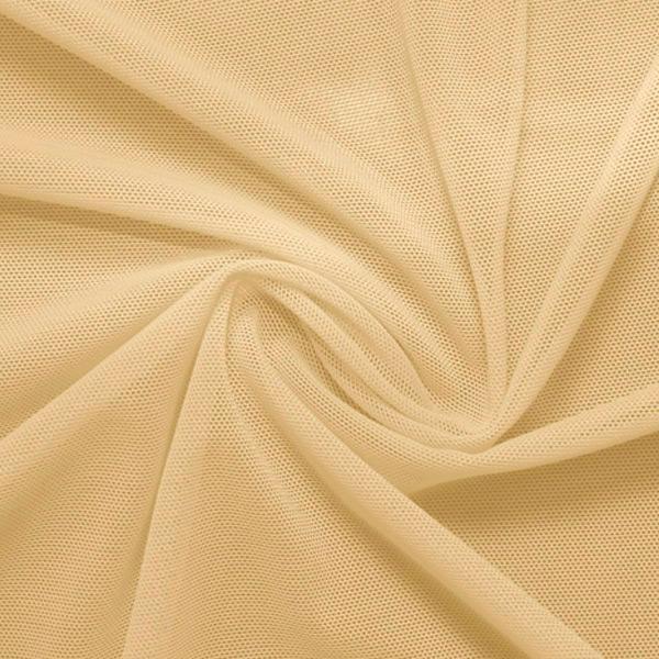 A swirled piece of nylon spandex power mesh in the color skin nude.