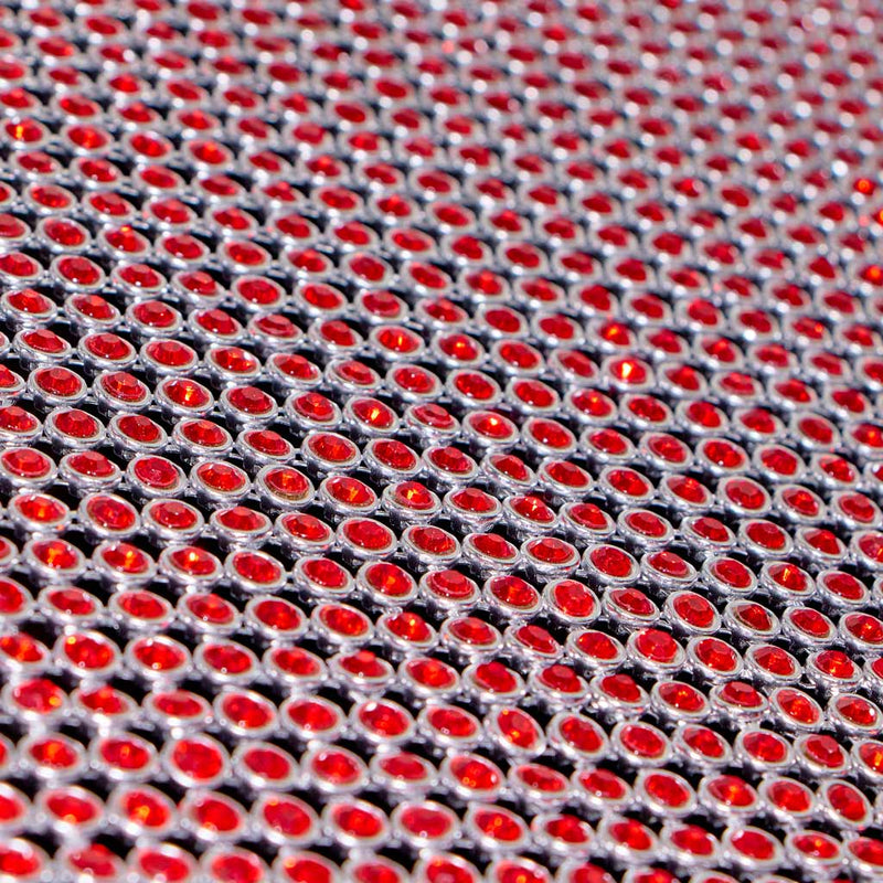 A flat sample of rhinestone aluminum scale mesh in the color red.