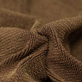Detailed interior shot of Ritzy Crinkle Nylon Polyester Spandex with Metallic in the color Brown