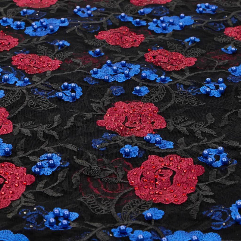 A flat sample of rose and vine embroiered mesh in the colors midnight black-red-blue.