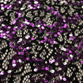A flat sample of Tango Stretch Lace Sequin in the color Black-Purple-Silver