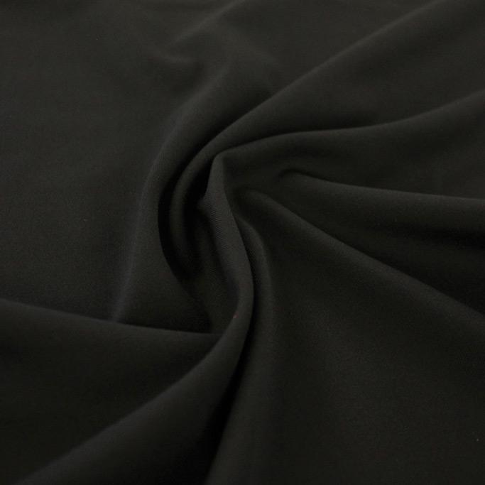 A swirled sample of TechFlex Micro Poly Spandex in color Black.