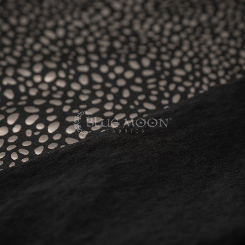 Detailed shot of Abstract Animal Foil Printed Spandex in color Black/Matte Gunmetal.