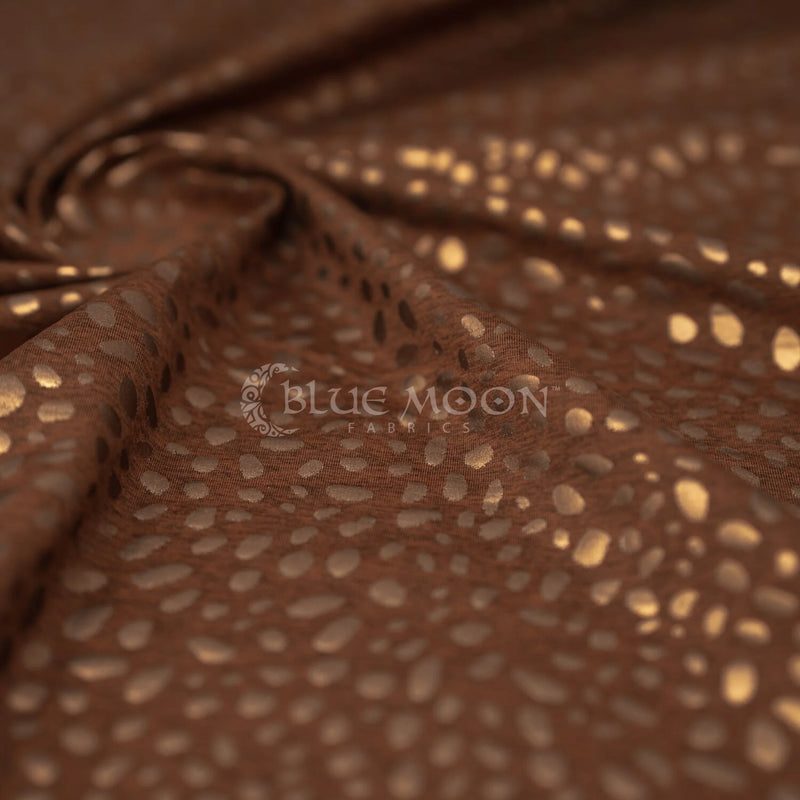 Detailed shot of Abstract Animal Foil Printed Spandex in color Espresso/Matte Dark Brown.