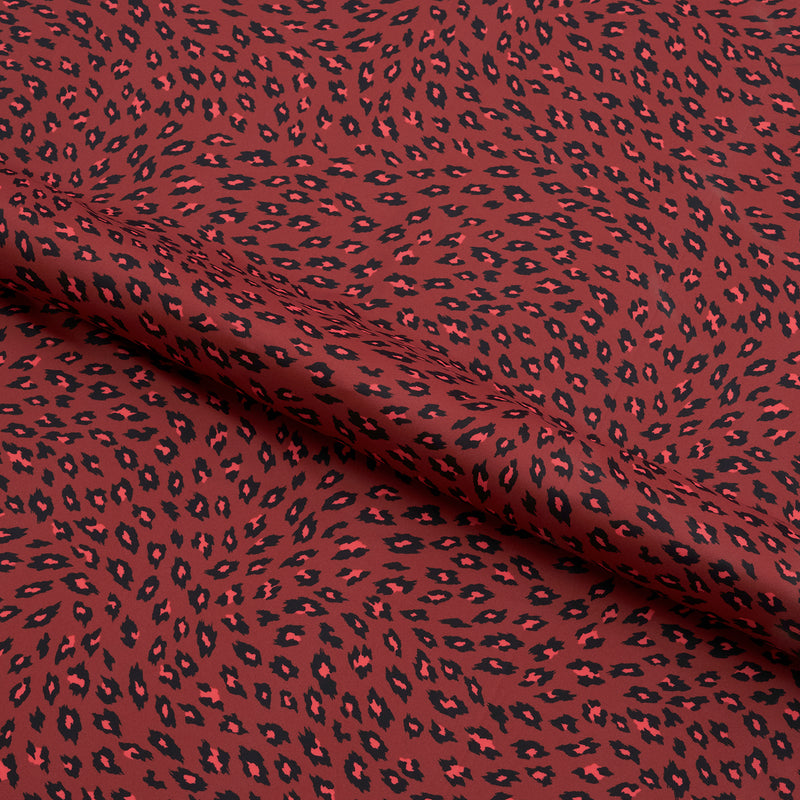 Black on Red Cheetah Printed Spandex Fabric | Blue Moon Fabrics