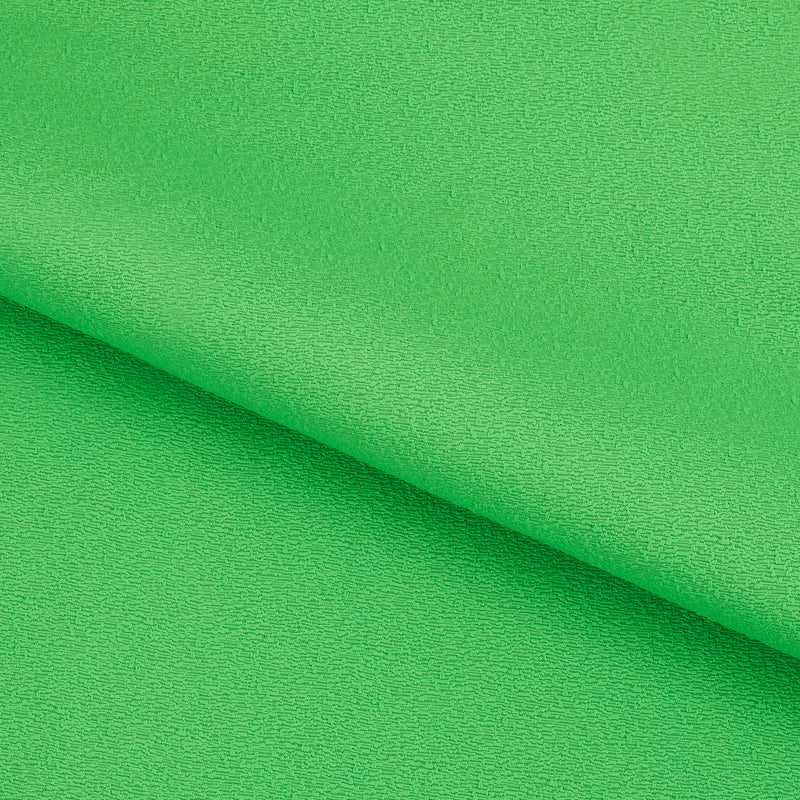 A textured piece of Scrunch Textured Recycled Nylon Spandex Fabric in color Classic Green.