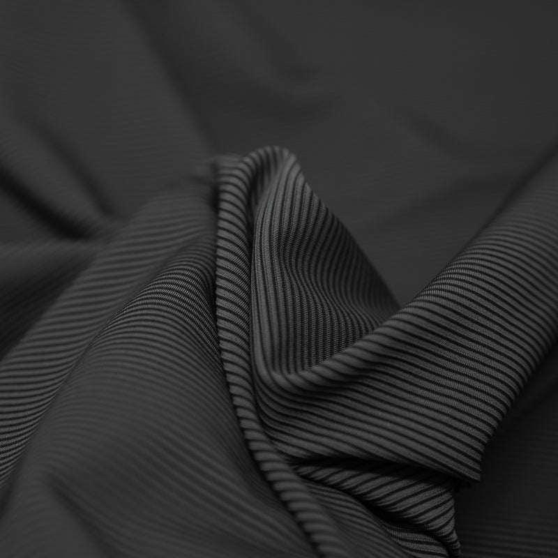 Detailed photograph of  Two Tone Stretch Rib Knit Fabric in the color black-charcoal