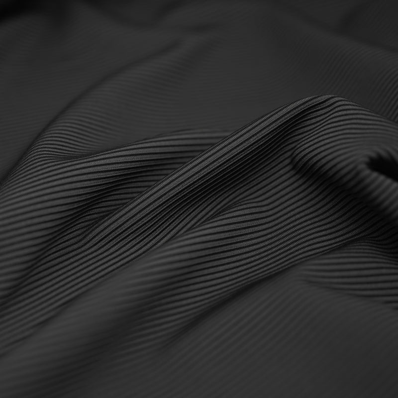 An image of Two Tone Stretch Rib Knit Fabric in the color black-charcoal
