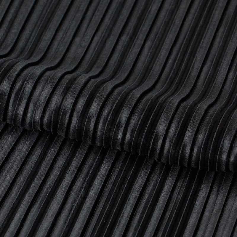 Detailed photograph of Titanium Pleated Polyester Fabric in the color black/black