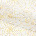A folded sample of Spiderweb Foiled Mesh Spandex Fabric in the color White/Gold