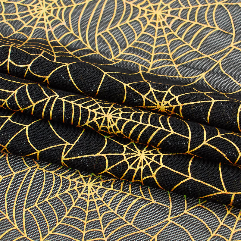 A folded sample of Spiderweb Foiled Mesh Spandex Fabric in the color Black/Gold