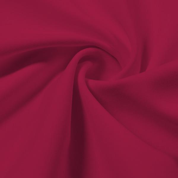 A swirled piece of Synergy Polyester Lycra in the color Dark Magenta