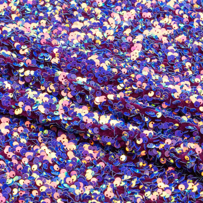 A sample of Duchess Stretch Velvet Sequin in the color Purple/Iridescent Purple