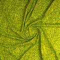 A swirled sample of zsa spa spandex sequin in the color lime.