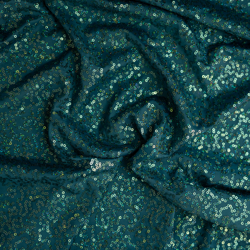 A swirled sample of zsa spa spandex sequin in the color teal.
