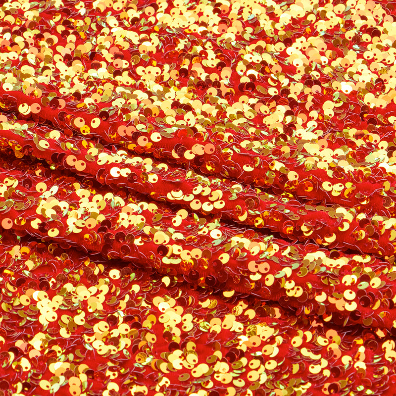 A sample of Duchess Stretch Velvet Sequin in the color  Red/Iridescent Red