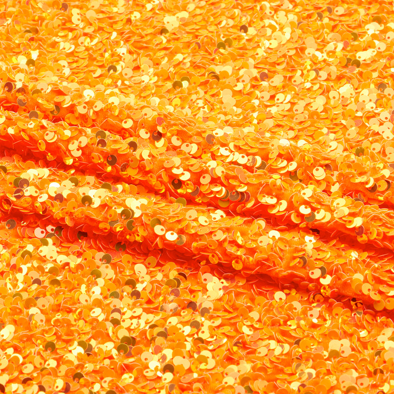 A sample of Duchess Stretch Velvet Sequin in the color Orange/Iridescent Orange