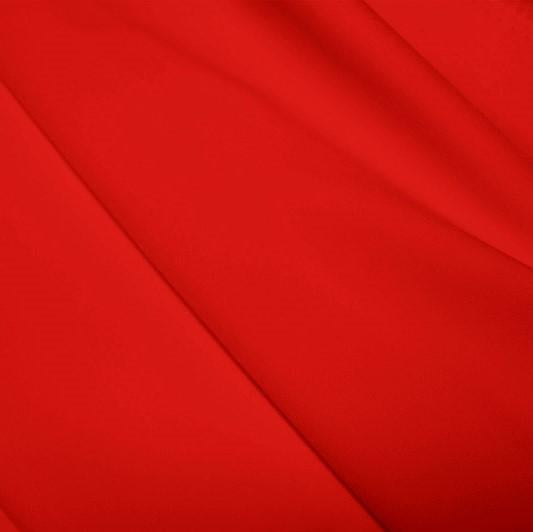 A flat sample of polyester lycra fabric in the color red.