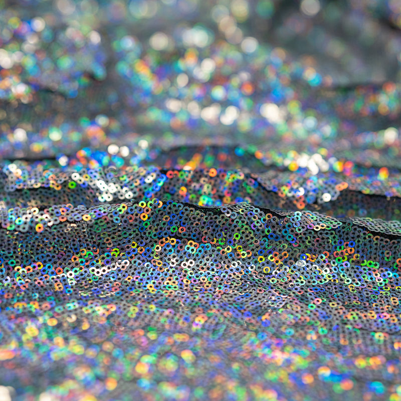 Detailed shot of Fever Stretch Mesh Sequin fabric.