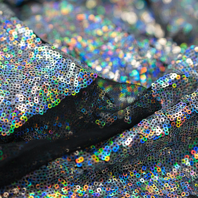 Detailed shot of Fever Stretch Mesh Sequin fabric.