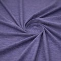 A swirled sample of EcoDelish Double Peached Melange recycled polyester spandex fabric in the color Periwinkle