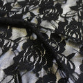 A swirled sample of Ada Stretch Lace in the color Black.