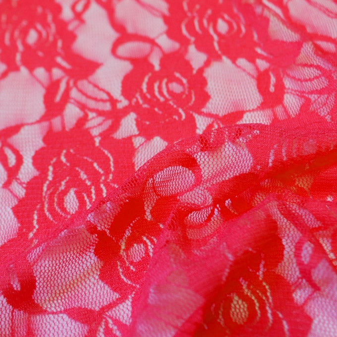 A swirled sample of Ada Stretch Lace in the color Cherry.