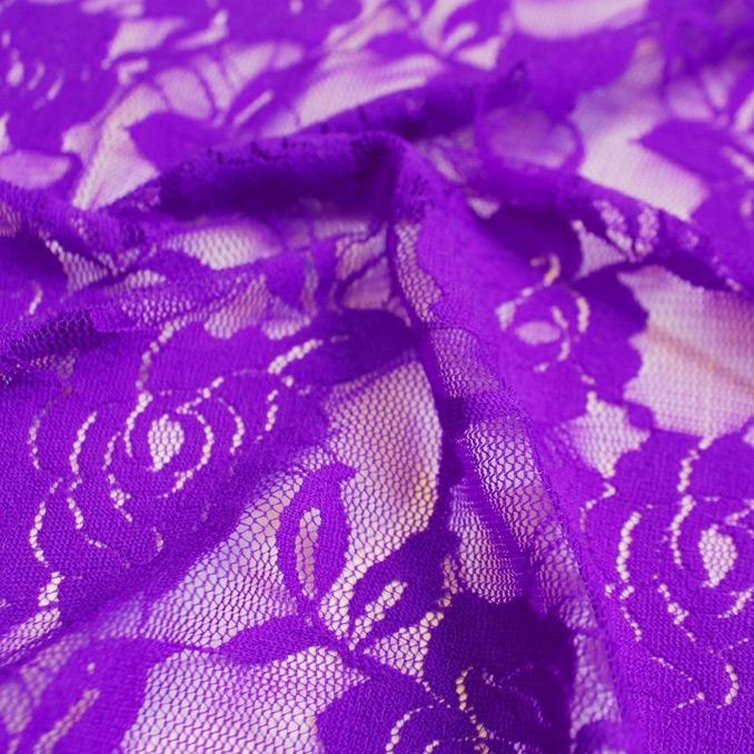 A swirled sample of Ada Stretch Lace in the color grape.